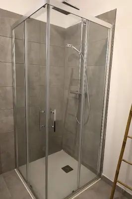 a shower with a glass door in a bathroom at Villa Tranquille - Maison 4 étoiles 2 Chambres Bonifacio in Bonifacio