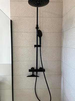 a shower with a shower head in a bathroom at Magnifique appartement T2 in Cuttoli-Corticchiato