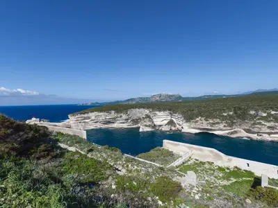 a view of the ocean from a cliff at Apartment Foce Dell Edera-2 by Interhome in Bonifacio