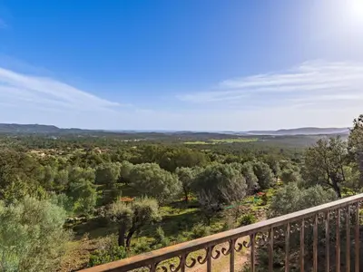 a view from the balcony of a house with trees at Holiday Home Casa Gialla by Interhome in Arraggio