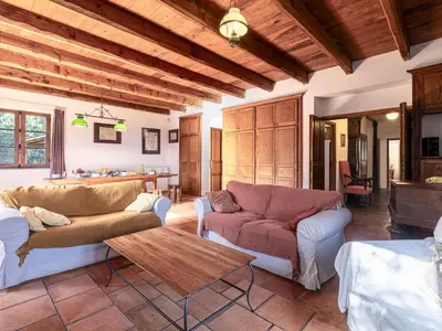 a living room with two couches and a table at Holiday Home Casa Gialla by Interhome in Arraggio