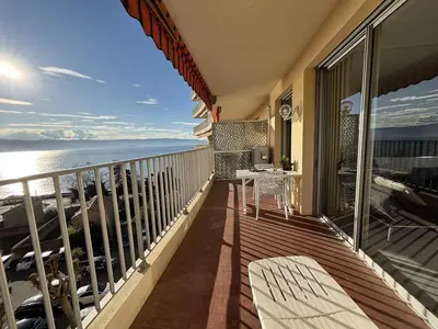 a balcony with a view of the ocean at Studio vue mer le Neptune sanguinaires Ajaccio in Ajaccio