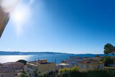 a view of a city and the water at Magnifique T3 de 85m2 de standing vue mer trottel in Ajaccio