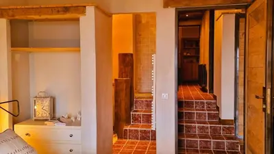 a room with a staircase in a house at Domaine de Gialla Bergerie Carta, 6 pers, montagne, vue mer in Porto-Vecchio