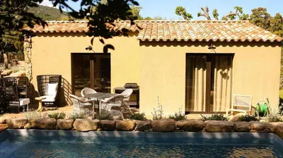 a house with a swimming pool in front of a house at Domaine de Gialla Bergerie Figa, 4 pers, piscine chauffée, 10 mn plage in Arraggio