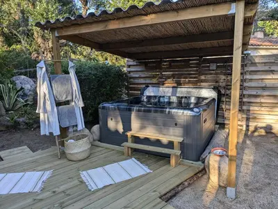 a large grill sitting on a wooden deck at L'Attellu di Babbu in Lecci