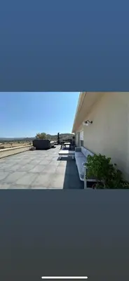 a building with couches and a view of the ocean at Villa Mawie in Sotta