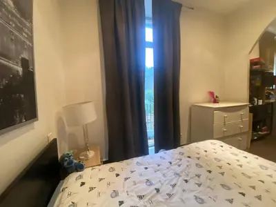 a bedroom with a bed and a window at Maison de charme in Sotta