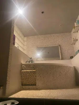 a bathroom with a sink and a mirror at Maison de charme in Sotta