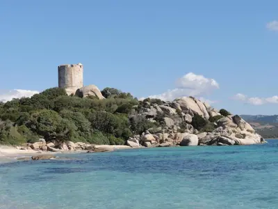 an island with a castle on top of it at Tozzasim in Pianottoli-Caldarello