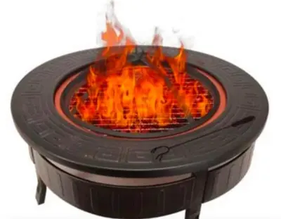 a fire pit that is engulfed in flames at Typical Corsican Village House with Garden in Calenzana