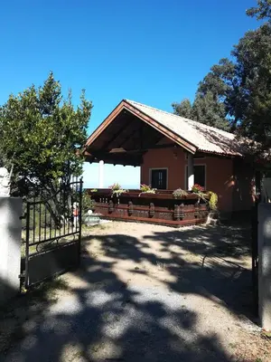 a house with a gate in front of it at Kallista 1 in San-Giuliano