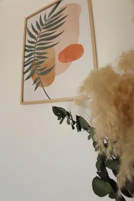 a teddy bear sitting next to a picture on a wall at Sublime Appartement avec Parking sur Ajaccio in Ajaccio