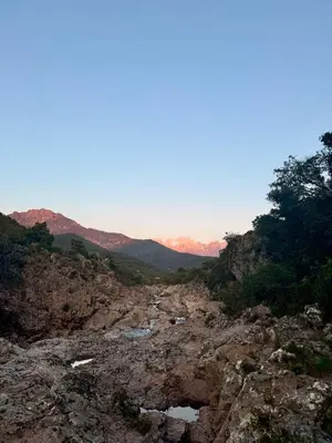 a view of a rocky mountain with a river at Bulle du Fangu in Galeria