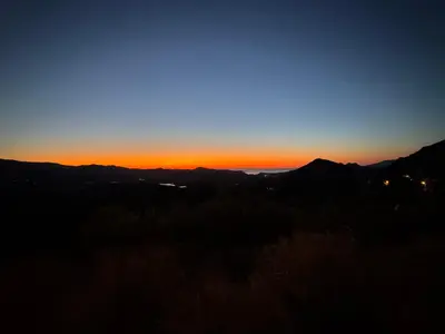 a view of the sunset from the top of a mountain at Casa di Pia, demeure Corse du XIXème in Olmeta-di-Tuda