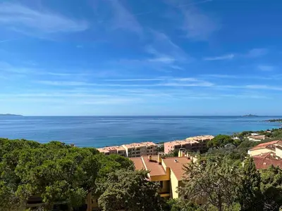 a view of the ocean from a resort at Studio vue mer in Ajaccio