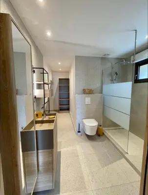 a bathroom with a toilet and a sink and a shower at Maison chaleureuse accès privé à la plage in Olmeto