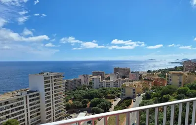 a view of the ocean from a balcony at Helios grand studio terrasse panoramique magique in Ajaccio