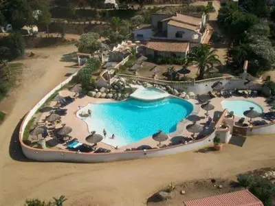 a playground with several different types of play equipment at Chalet 3 étoiles - Piscine - ccb0fdc in Viggianello
