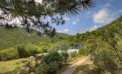 a swimming pool in the middle of a mountain at A Machja 16 in Monacia-dʼAullène