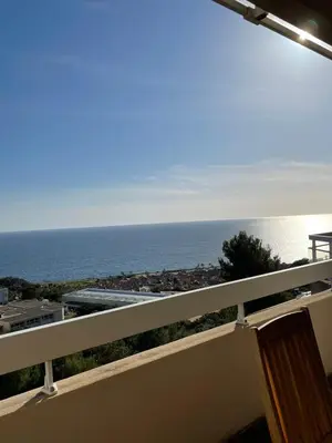 a balcony with a view of the ocean at Ajaccio sanguinaires F3 in Ajaccio