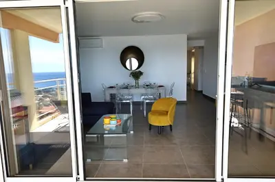 a circular window in a ceiling with a view of the ocean at Acula Marina - Mer, Maquis Corse - T4 Lumineux in Ajaccio