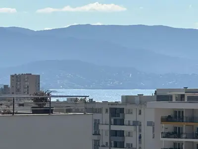 a view of the ocean from a building at Ajaccio Apartment STUDIO in Ajaccio