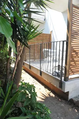 a kitchen with a sink and a stove top oven at Appartement Lido de la Marana in Lucciana