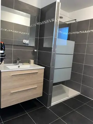 a bathroom with a sink and a shower at 9D - appartement Bonifacio Corse in Bonifacio