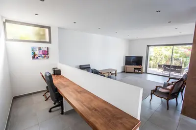 an office with a desk and chairs in a room at DelSol - Villa Pool Gorgeous Sea view - by TGB in Pietrosella