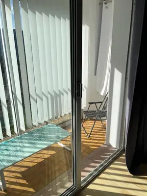 a glass door with a glass floor in a room at olmareddu in Alata