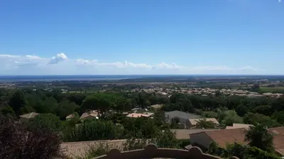 a view of a city from a roof at Appartements Luccisano in Borgo