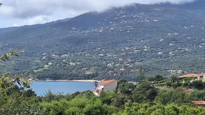 a view of a lake with a mountain at Résidence Dolce Vita in Propriano