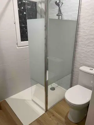 a bathroom with a shower and a toilet at A Casetta Di Oletta in Oletta