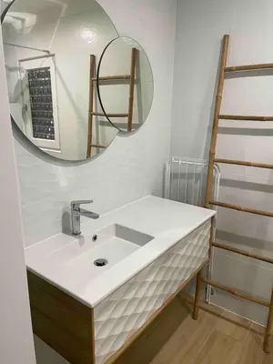 a bathroom with a sink and a mirror at A Casetta Di Oletta in Oletta