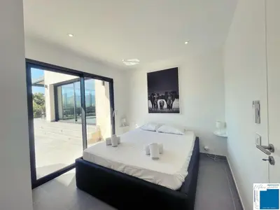 a bathroom with a sink and a shower and a sink at Architect's Villa - 10-12 people - Pool - 4 bedrooms in Zonza