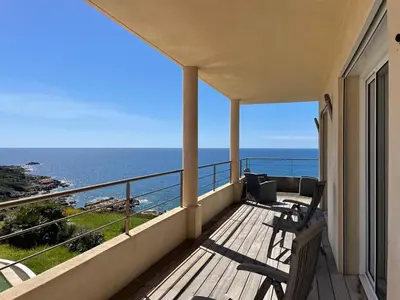 a balcony of a house with a view of the ocean at Casamea - Sagone, Villa Vue Mer, Clim, Piscine in Coggia
