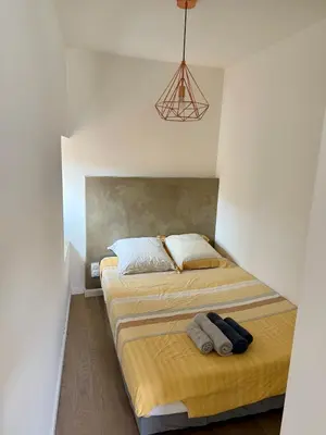 a bathroom with a sink and a shower at T2 Cosy HYPER CENTRE AJACCIO in Ajaccio