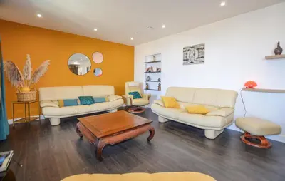 a living room with two couches and a table at Gorgeous Home In Cervione With Wifi in Cervione