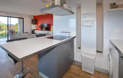 a kitchen with a white counter top in a room at 2 Bedroom Lovely Home In Cervione in Cervione