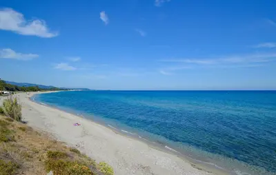 a view of a beach with the ocean at 2 Bedroom Lovely Home In Cervione in Cervione