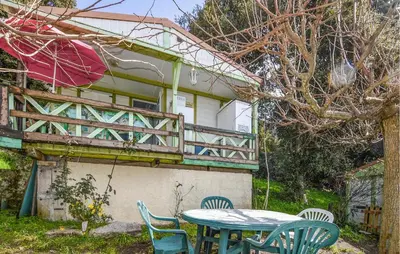 a table and chairs in front of a house at Gorgeous Stacaravan In Casalabriva in Casalabriva