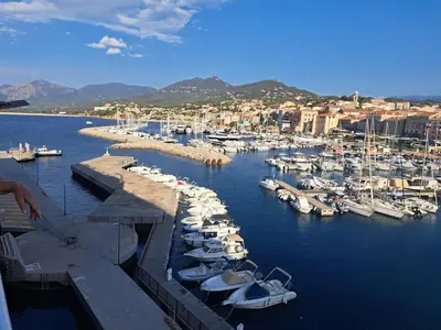 a group of boats docked in a marina at Fozzano in Fozzano