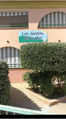 a sign for a las jardines die la mer at Appartement avec piscine in Linguizzetta