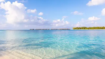 an island in the middle of a large body of water at Corsica Bella 87 T2 Cosy piscines proche plage in Lecci