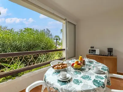 a table with a bowl of fruit on a balcony at Apartment Casa Antonio by Interhome in Linguizzetta