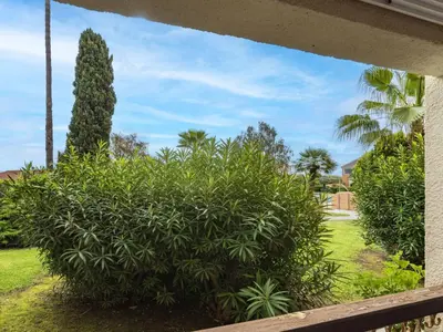 a view of a garden from a porch at Apartment Casa Antonio by Interhome in Linguizzetta