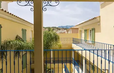 a view from the balcony of a building at Appartement cosy Vue Mer et Montagne in Sari Solenzara