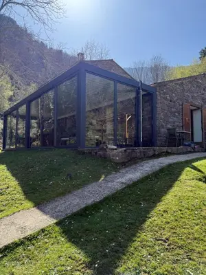 a glass house in the middle of a yard at Gite d'étape Auberge Luna Piena in Santa-Reparata-di-Moriani