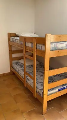 a set of bunk beds in a room at Gite d'étape Auberge Luna Piena in Santa-Reparata-di-Moriani
